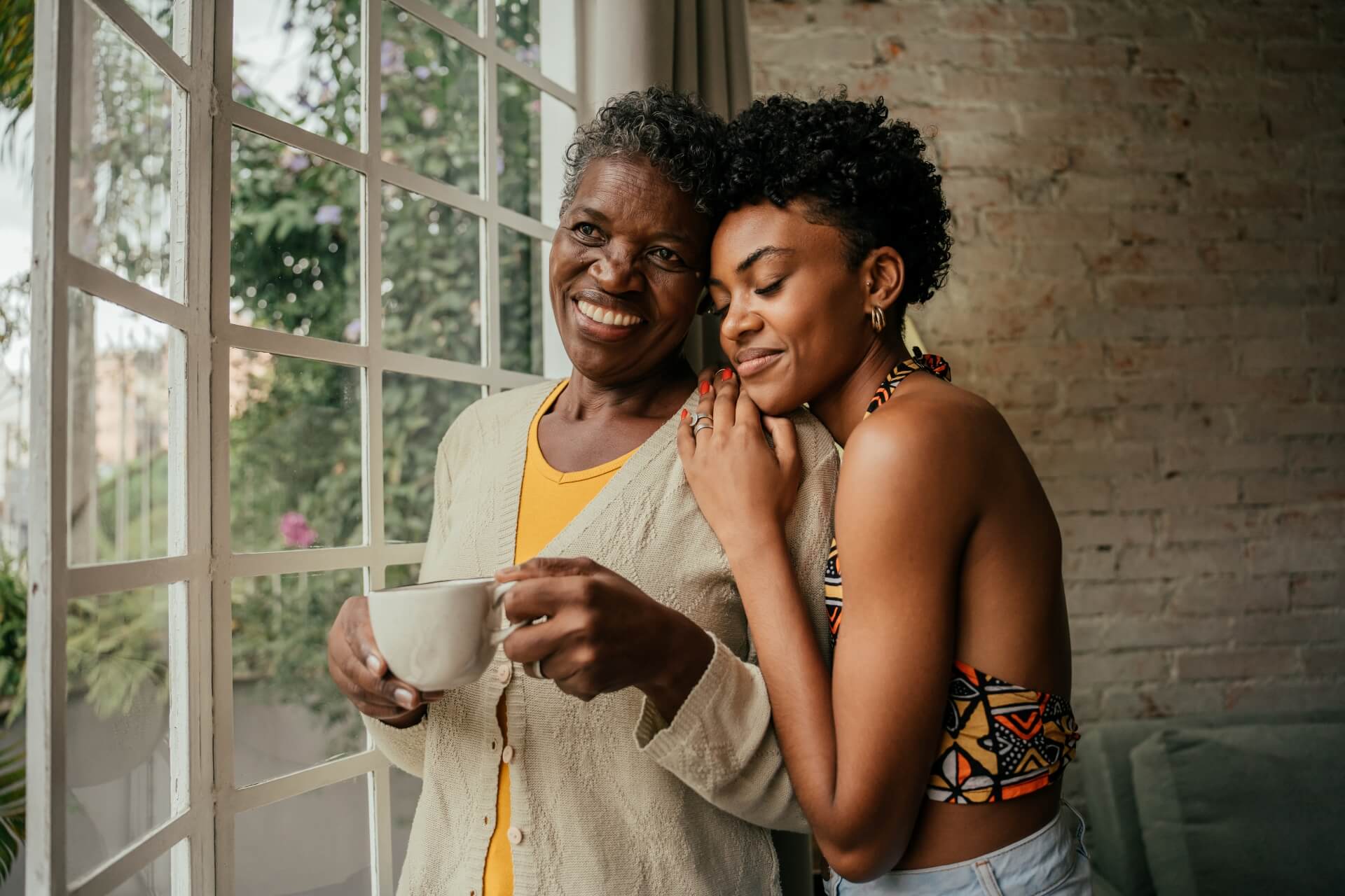 Restore your smile to make it look more beautiful A mature woman and her daughter hugging