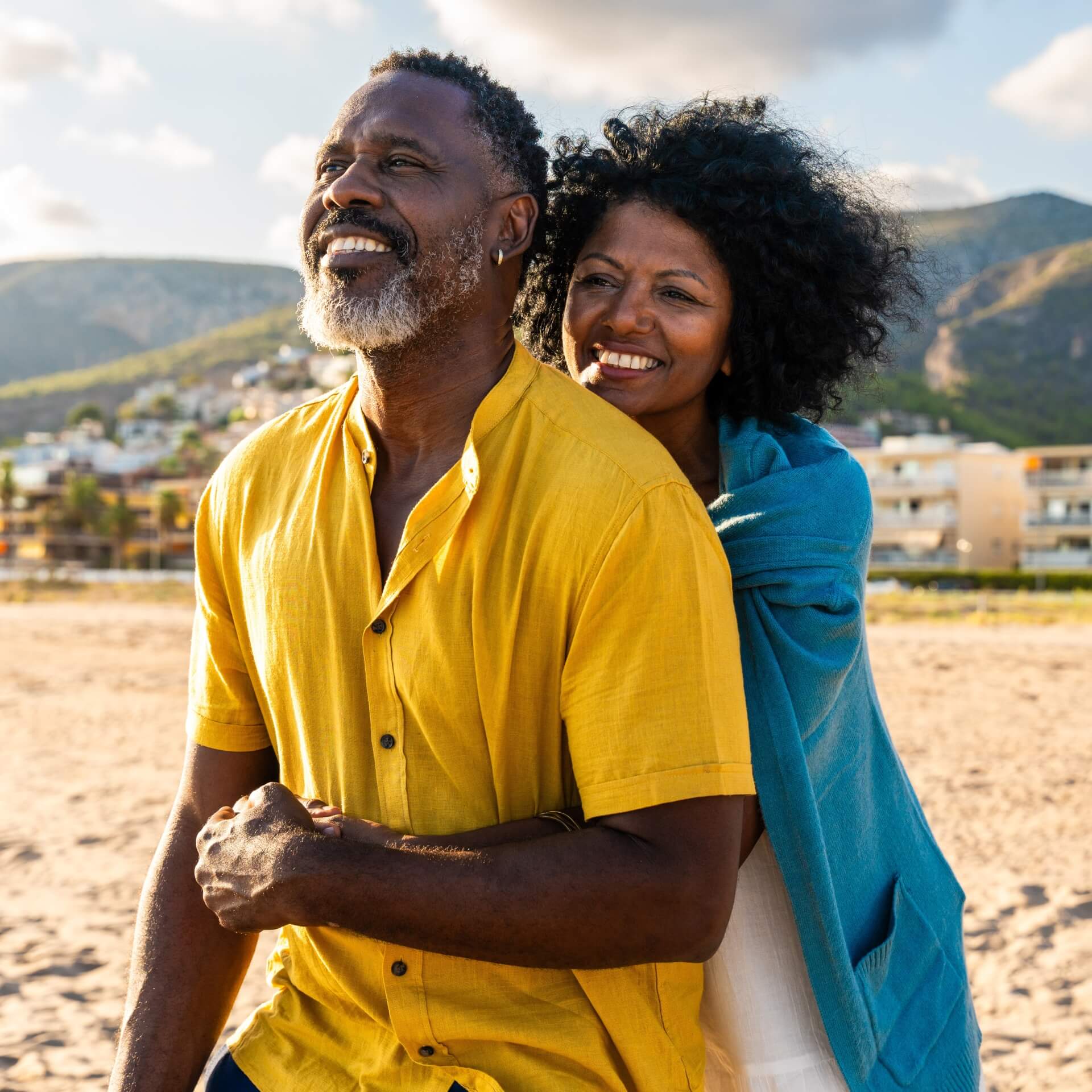 Save Time Before Your Appointment: Quick & Easy Steps! Image of a couple hugging and smiling on the beach