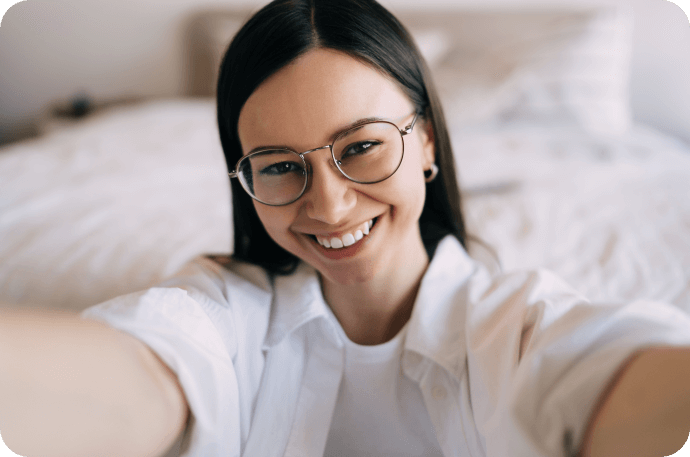 The photo of a young woman smilling