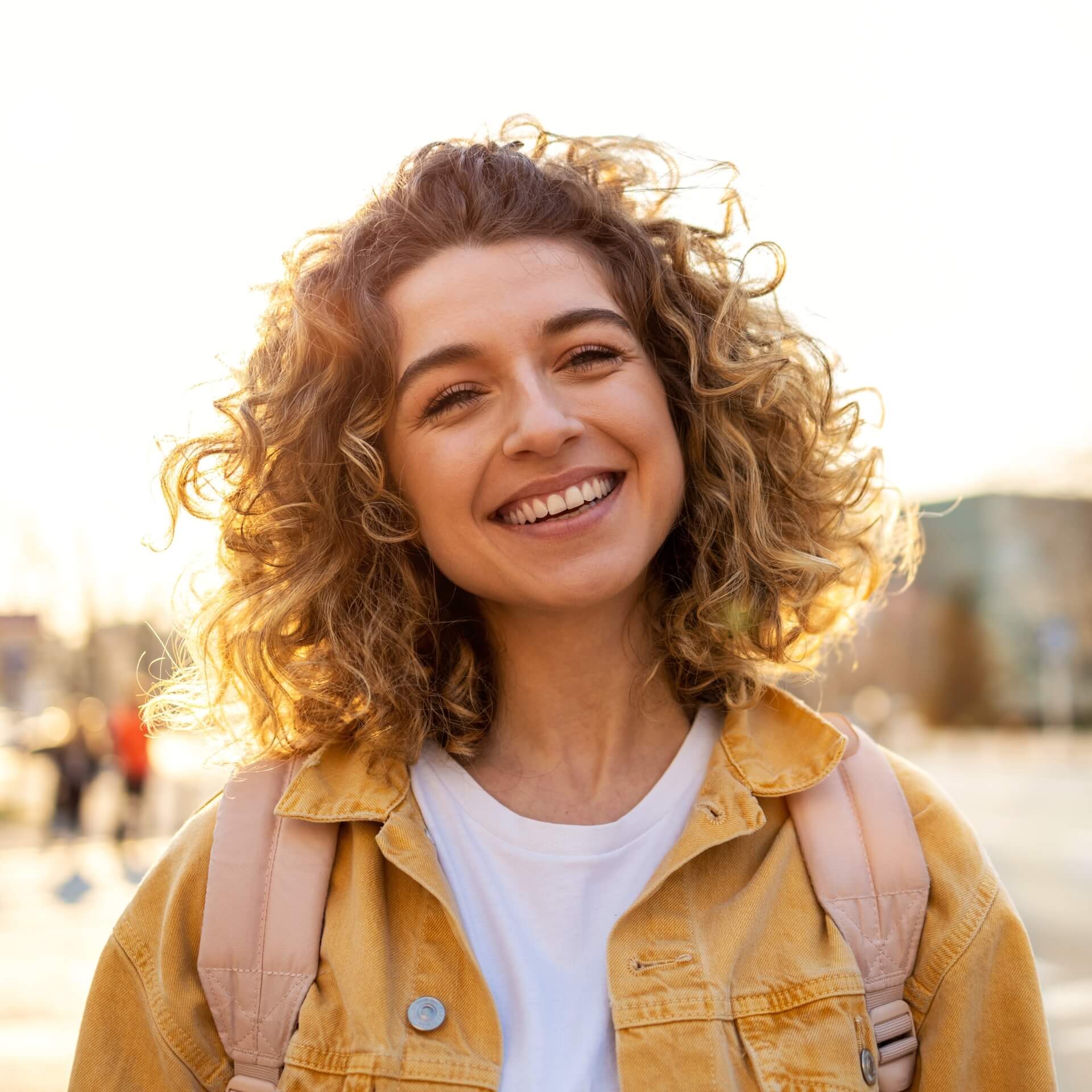 Get the smile of your dreams with our cosmetic dentistry treatments A young woman with beautiful smile smiling